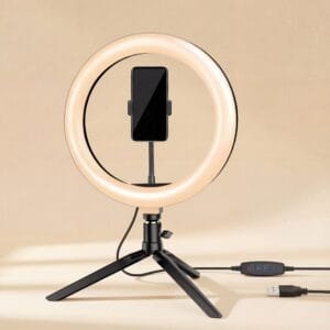 Mini ring light LED de bureau sur trépied pour smartphone et télétravail.